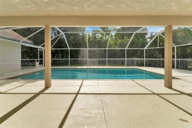 Welcome to this beautifully updated 4-bedroom, 2.5-bathroom pool on TPC Eagle Trace in Florida - for sale on GolfHomes.com, golf home, golf lot