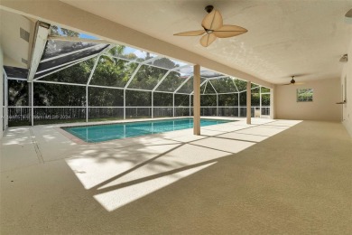 Welcome to this beautifully updated 4-bedroom, 2.5-bathroom pool on TPC Eagle Trace in Florida - for sale on GolfHomes.com, golf home, golf lot