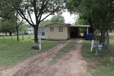 Discover the potential of this charming property situated within on Flying L Guest Ranch in Texas - for sale on GolfHomes.com, golf home, golf lot