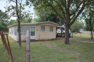 Discover the potential of this charming property situated within on Flying L Guest Ranch in Texas - for sale on GolfHomes.com, golf home, golf lot