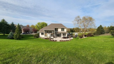 Location, location,location! This property backs up to a mature on Western Lakes Golf Club in Wisconsin - for sale on GolfHomes.com, golf home, golf lot