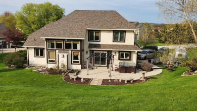 Location, location,location! This property backs up to a mature on Western Lakes Golf Club in Wisconsin - for sale on GolfHomes.com, golf home, golf lot