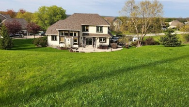 Location, location,location! This property backs up to a mature on Western Lakes Golf Club in Wisconsin - for sale on GolfHomes.com, golf home, golf lot