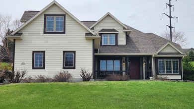 Location, location,location! This property backs up to a mature on Western Lakes Golf Club in Wisconsin - for sale on GolfHomes.com, golf home, golf lot