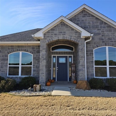 Discover this stunning 2022 custom-built home nestled in the on White Bluff Resort - New Course in Texas - for sale on GolfHomes.com, golf home, golf lot