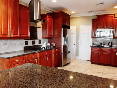 The moment you walk in, you feel it -- space, light, freedom. A on Woodlands Country Club in Florida - for sale on GolfHomes.com, golf home, golf lot