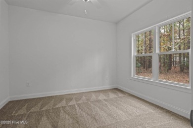 The seller is offering $20,000 to use as you choose. The on Woodlake Country Club in North Carolina - for sale on GolfHomes.com, golf home, golf lot