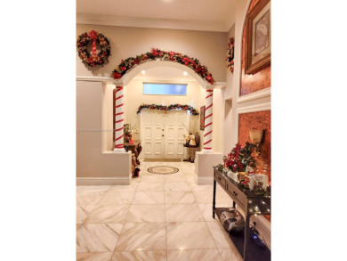 The moment you walk in, you feel it -- space, light, freedom. A on Woodlands Country Club in Florida - for sale on GolfHomes.com, golf home, golf lot