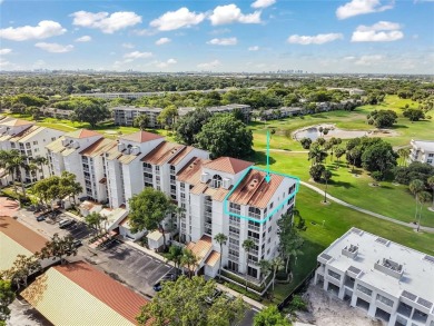 Experience true penthouse living in this exceptional top-floor on Palm-Aire Country Club and Resort - The Oaks in Florida - for sale on GolfHomes.com, golf home, golf lot