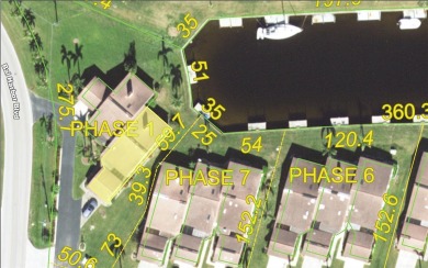 Live the waterfront dream! Impressive villa at Villas of Bal on Saint Andrews South Golf Club in Florida - for sale on GolfHomes.com, golf home, golf lot