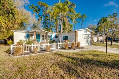 This stunning two-bedroom, two-bathroom home is ready for you to on Pine Lakes Country Club in Florida - for sale on GolfHomes.com, golf home, golf lot