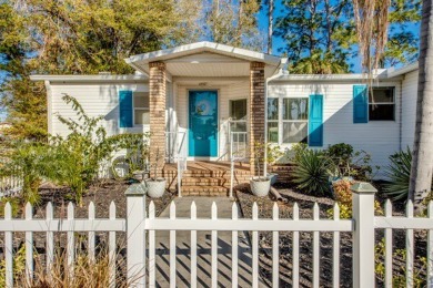 This stunning two-bedroom, two-bathroom home is ready for you to on Pine Lakes Country Club in Florida - for sale on GolfHomes.com, golf home, golf lot