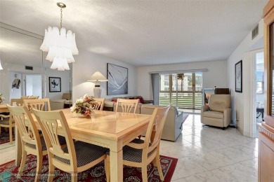 SALE OF THE CENTURY IN VIBRANT & HIGHLY SOUGHT AFTER WYNMOOR! on Wynmoor Golf Course in Florida - for sale on GolfHomes.com, golf home, golf lot