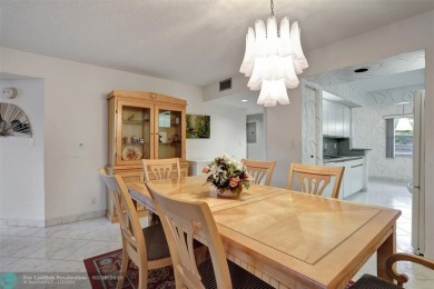 SALE OF THE CENTURY IN VIBRANT & HIGHLY SOUGHT AFTER WYNMOOR! on Wynmoor Golf Course in Florida - for sale on GolfHomes.com, golf home, golf lot