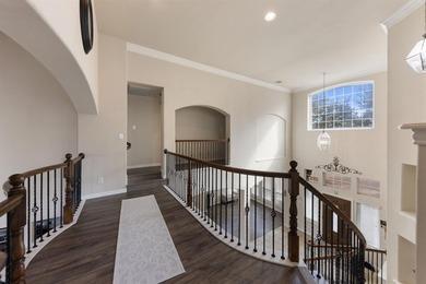 Discover elevated living in this stunning 5-bedroom home in on Lantana Golf Club in Texas - for sale on GolfHomes.com, golf home, golf lot