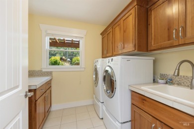 Discover peaceful, turnkey living in this fabulous geothermal on Warm Springs Golf Club in Idaho - for sale on GolfHomes.com, golf home, golf lot