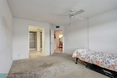 SALE OF THE CENTURY IN VIBRANT & HIGHLY SOUGHT AFTER WYNMOOR! on Wynmoor Golf Course in Florida - for sale on GolfHomes.com, golf home, golf lot