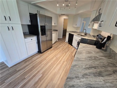 BEAUTIFULLY REMODELED! WONDERFUL LAKE VIEWS! Set in the popular on Golf Hammock Country Club in Florida - for sale on GolfHomes.com, golf home, golf lot