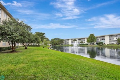 SALE OF THE CENTURY IN VIBRANT & HIGHLY SOUGHT AFTER WYNMOOR! on Wynmoor Golf Course in Florida - for sale on GolfHomes.com, golf home, golf lot