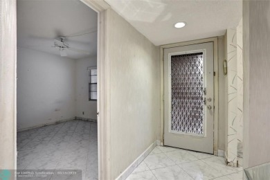 SALE OF THE CENTURY IN VIBRANT & HIGHLY SOUGHT AFTER WYNMOOR! on Wynmoor Golf Course in Florida - for sale on GolfHomes.com, golf home, golf lot