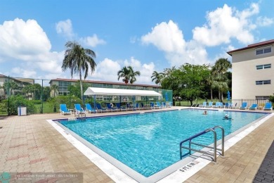 SALE OF THE CENTURY IN VIBRANT & HIGHLY SOUGHT AFTER WYNMOOR! on Wynmoor Golf Course in Florida - for sale on GolfHomes.com, golf home, golf lot