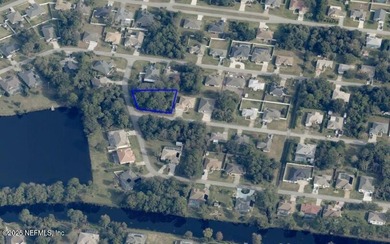 Build your dream home on this spacious .37-acre vacant lot on Palm Harbor Golf Club in Florida - for sale on GolfHomes.com, golf home, golf lot