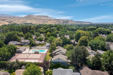 Discover peaceful, turnkey living in this fabulous geothermal on Warm Springs Golf Club in Idaho - for sale on GolfHomes.com, golf home, golf lot