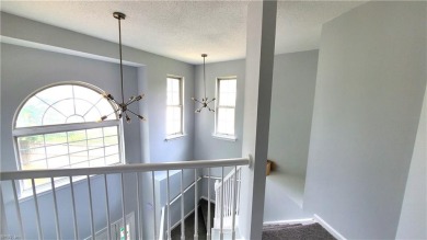 Two-bedroom end unit townhome with OFFICE, all new flooring on Kiln Creek Golf and Country Club in Virginia - for sale on GolfHomes.com, golf home, golf lot