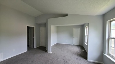 Two-bedroom end unit townhome with OFFICE, all new flooring on Kiln Creek Golf and Country Club in Virginia - for sale on GolfHomes.com, golf home, golf lot