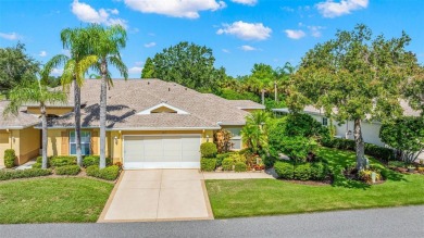 Welcome to this lushly landscaped 2 bedrooms, 2 bath condominium on Scepter Golf Club in Florida - for sale on GolfHomes.com, golf home, golf lot