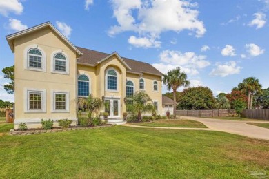 Nestled on the prestigious island green of hole #5, this on Tiger Point Golf and Country Club in Florida - for sale on GolfHomes.com, golf home, golf lot