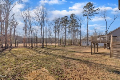 Enjoy this beautiful custom built MOVE-IN READY home perfectly on River Golf and County Club at Lake Royale in North Carolina - for sale on GolfHomes.com, golf home, golf lot