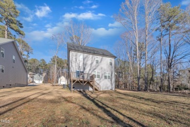 Enjoy this beautiful custom built MOVE-IN READY home perfectly on River Golf and County Club at Lake Royale in North Carolina - for sale on GolfHomes.com, golf home, golf lot