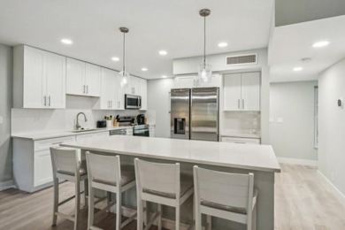 Architecturally designed, open kitchen and completely gut on Riverbend Golf Club in Florida - for sale on GolfHomes.com, golf home, golf lot