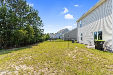 Welcome to this nearly new gem, built in June 2023, ideally on Lennon Hills Golf Course in North Carolina - for sale on GolfHomes.com, golf home, golf lot