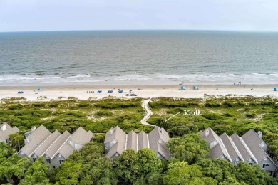 Discover an extraordinary coastal retreat in this beautifully on Kiawah Island Resort - Cougar Point in South Carolina - for sale on GolfHomes.com, golf home, golf lot