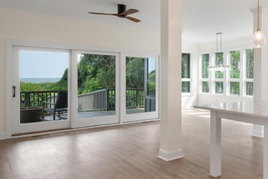 Discover an extraordinary coastal retreat in this beautifully on Kiawah Island Resort - Cougar Point in South Carolina - for sale on GolfHomes.com, golf home, golf lot