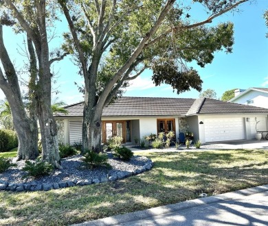 Premier Feather Sound community home centrally located and on Feather Sound Country Club in Florida - for sale on GolfHomes.com, golf home, golf lot