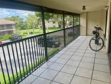 Great second floor 2 bedroom, 2 bath condo with large patio on Deer Creek Golf Club in Florida - for sale on GolfHomes.com, golf home, golf lot