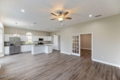 This spacious and stately 3 bedroom 2.5 bath townhome offers the on Panama Country Club in Florida - for sale on GolfHomes.com, golf home, golf lot