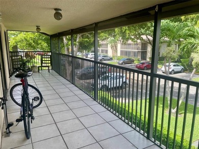 Great second floor 2 bedroom, 2 bath condo with large patio on Deer Creek Golf Club in Florida - for sale on GolfHomes.com, golf home, golf lot