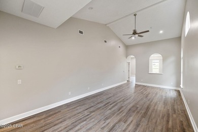 This spacious and stately 3 bedroom 2.5 bath townhome offers the on Panama Country Club in Florida - for sale on GolfHomes.com, golf home, golf lot