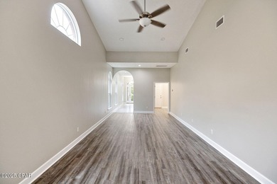 This spacious and stately 3 bedroom 2.5 bath townhome offers the on Panama Country Club in Florida - for sale on GolfHomes.com, golf home, golf lot