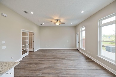 This spacious and stately 3 bedroom 2.5 bath townhome offers the on Panama Country Club in Florida - for sale on GolfHomes.com, golf home, golf lot