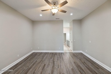 This spacious and stately 3 bedroom 2.5 bath townhome offers the on Panama Country Club in Florida - for sale on GolfHomes.com, golf home, golf lot