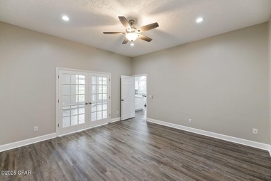 This spacious and stately 3 bedroom 2.5 bath townhome offers the on Panama Country Club in Florida - for sale on GolfHomes.com, golf home, golf lot