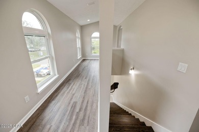 This spacious and stately 3 bedroom 2.5 bath townhome offers the on Panama Country Club in Florida - for sale on GolfHomes.com, golf home, golf lot