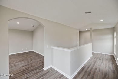 This spacious and stately 3 bedroom 2.5 bath townhome offers the on Panama Country Club in Florida - for sale on GolfHomes.com, golf home, golf lot