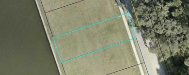 Yacht Harbor Village - Salt Water canal home site is awaiting on Hammock Dunes Club in Florida - for sale on GolfHomes.com, golf home, golf lot