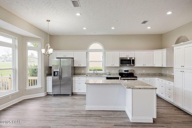 This spacious and stately 3 bedroom 2.5 bath townhome offers the on Panama Country Club in Florida - for sale on GolfHomes.com, golf home, golf lot